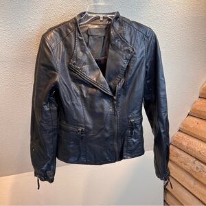 BLANK NYC Black Faux Leather Moto Jacket. Zip Closure, zip pockets and wrists.